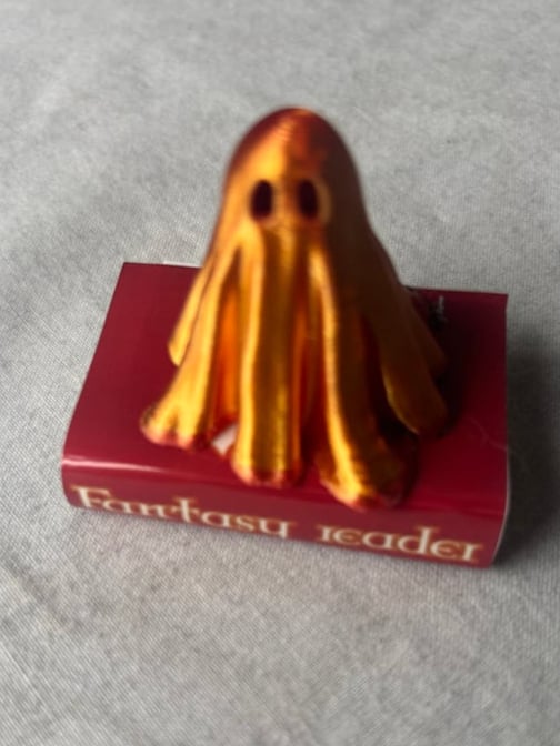 Image of Ghost with trope book 