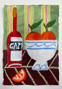 Campari with oranges in vase