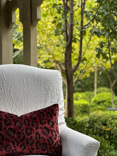 Image of Unexpected Red Leopard Ikat Cushion
