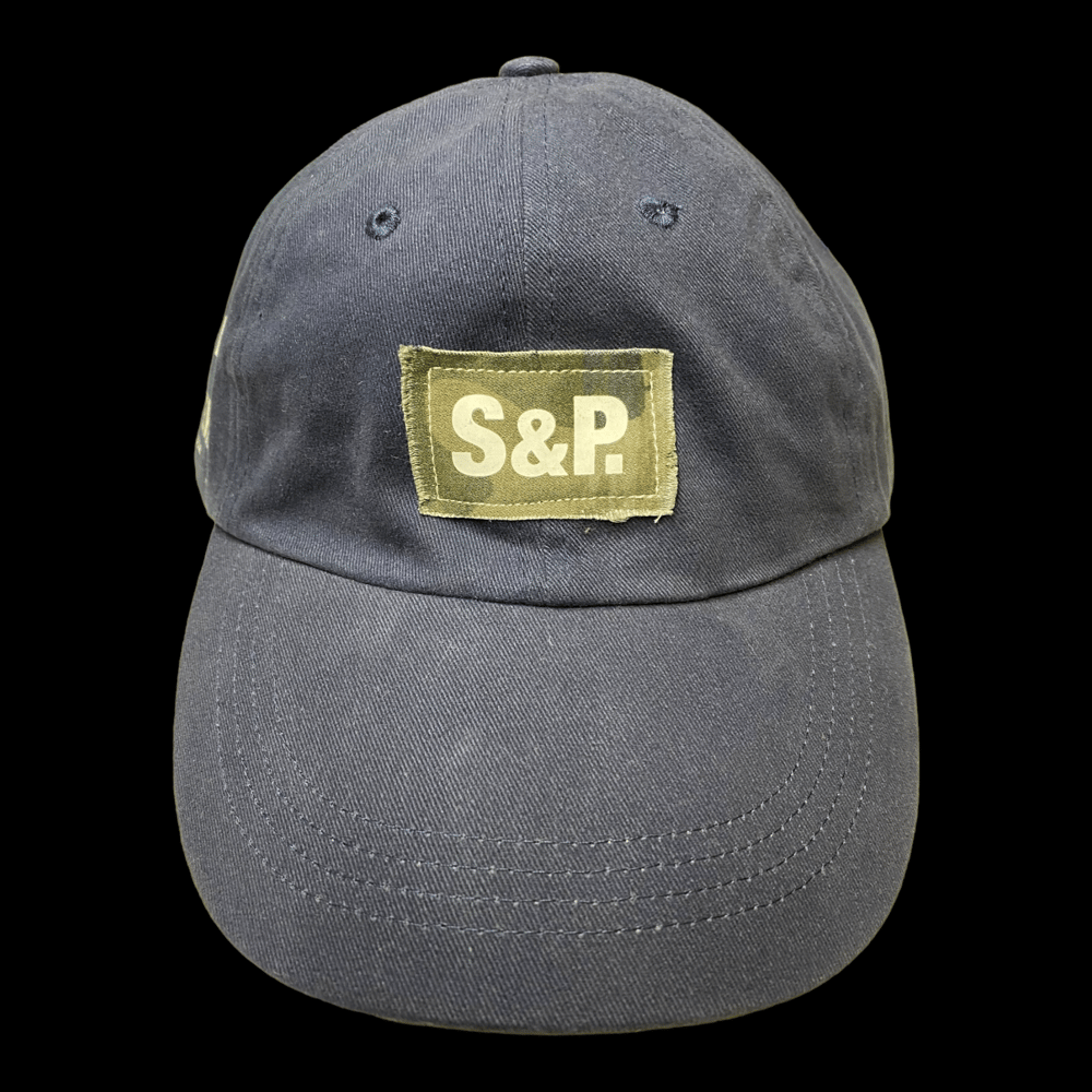 Image of S&P-“Straight Forward + Stacked Type” Logo Camo PatchWork Washed 6-Panel StrapBack Cap (Navy)