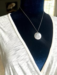 Image 13 of sapphire pendant with hand engraved Shakespeare quote