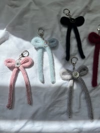 Image 2 of button bow keychains 