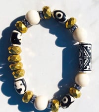  Riverstone with Gold-Plated Faceted and Tibetan Accent Beads