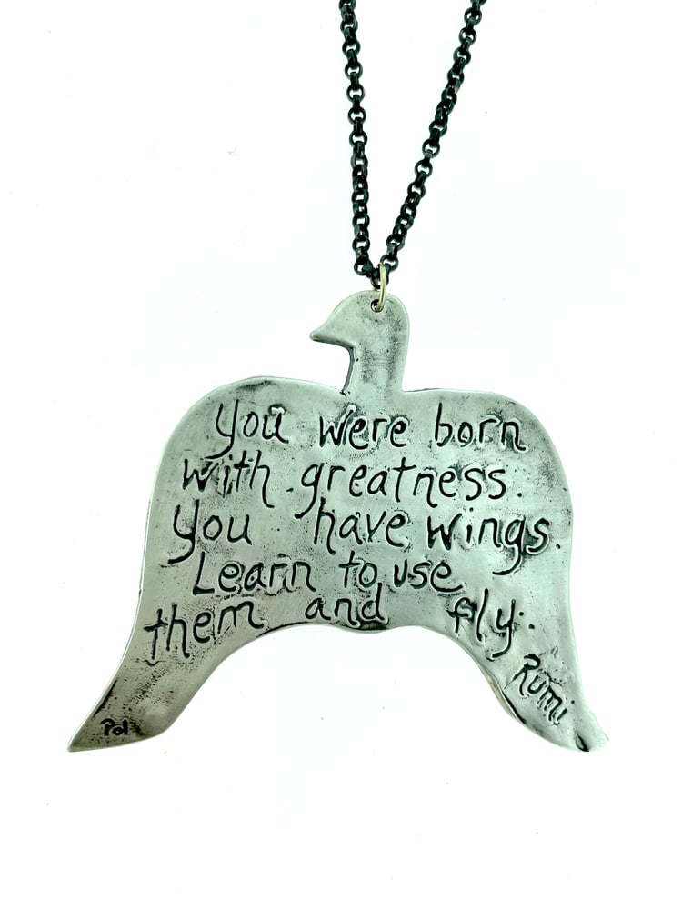 Image of thunderbird statment necklace with Rumi quote