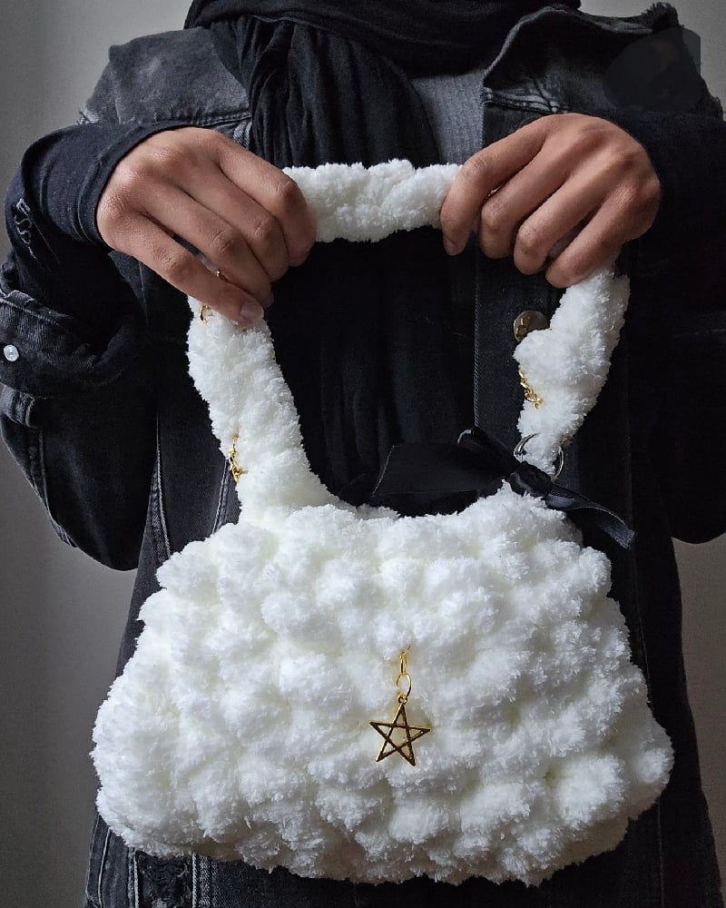 Image of white fluffy crochet handbag