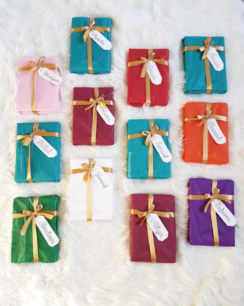 Image of Tissue paper and name tag gift wrapping 