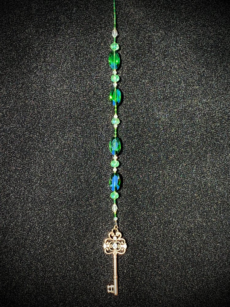 Image of “Skeleton Key” Sun Catcher