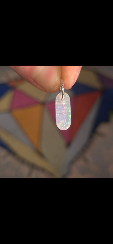 Image of Dichropal capsule charm 