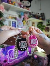 Image 2 of Llavero perlas Tamagotchi clicker