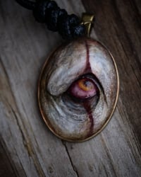Image 4 of Pennywise Eye glow in the dark pendant OOAK