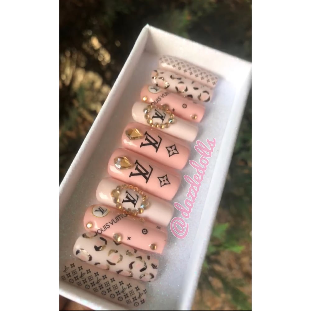 Image of pink square shaped LV inspired set