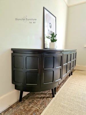Image of Long Curved Nathan Sideboard in Black on Black wooden tapered legs