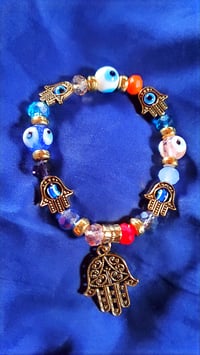 Image 1 of Evil eyes palm bracelets 