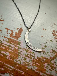 Image 1 of sterling silver moon with breathe inscription