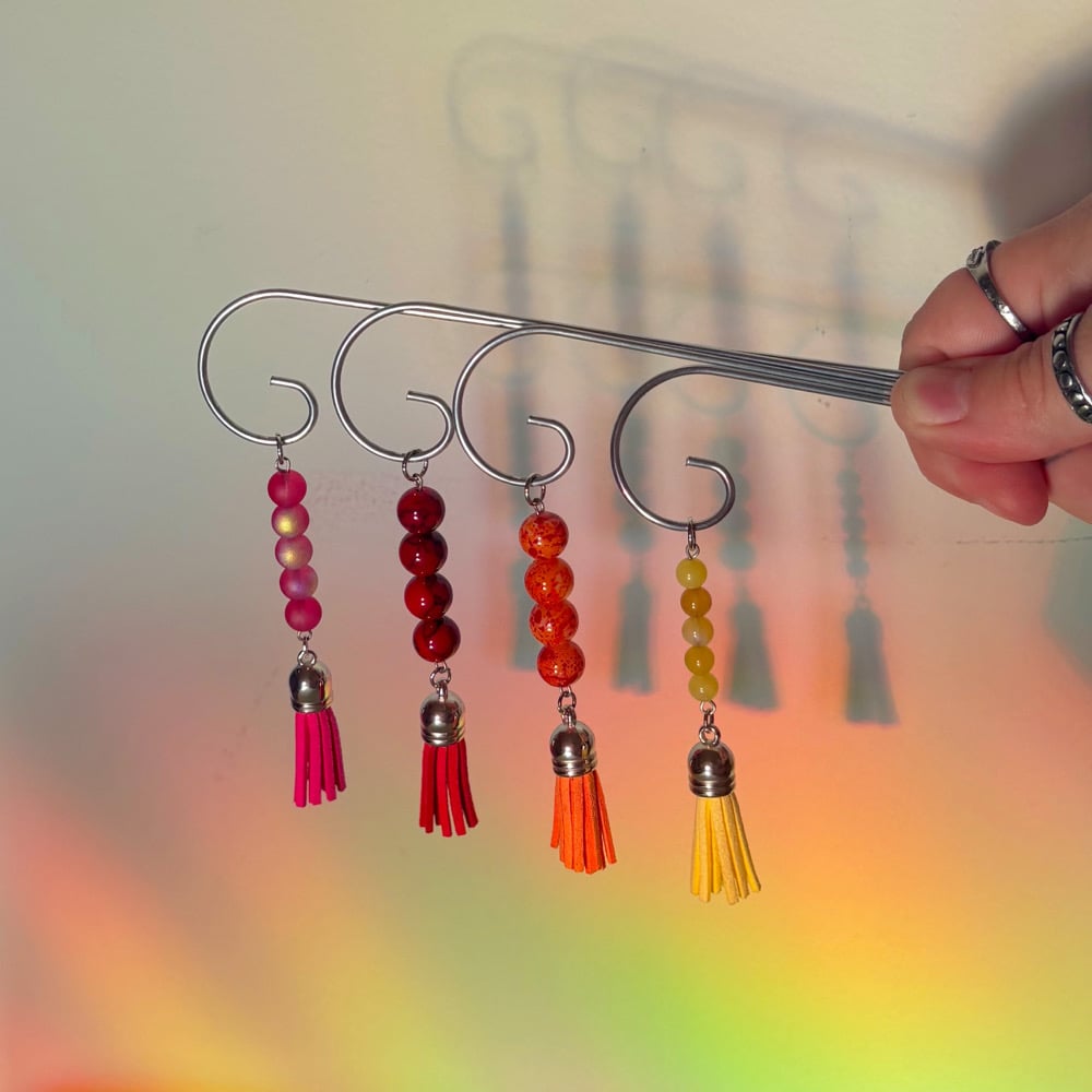 Image of rainbow planter stakes