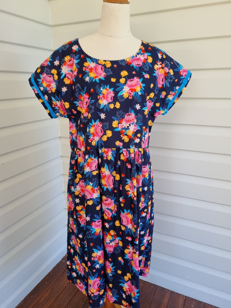 Image of HANNAH Frill in NAVY FLORAL Available in MEDIUM & LARGE. 