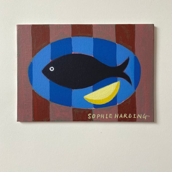 Image of Fish and Lemon Wedge