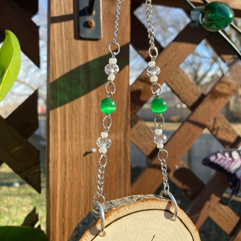 Image of malachite flight sun catcher 