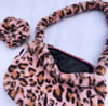 Plush leopard faux fur shoulder bag