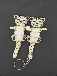 Snow Leopard magnetic buddies