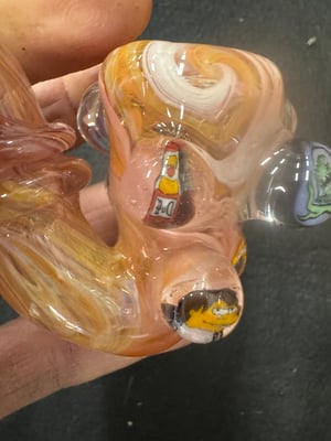 Image of Simpsons hand jammin Sherlock 