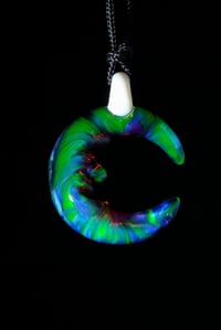 Image 2 of Uv reactive Cresent moon pendant.
