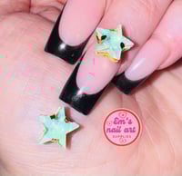 Image 1 of green stars