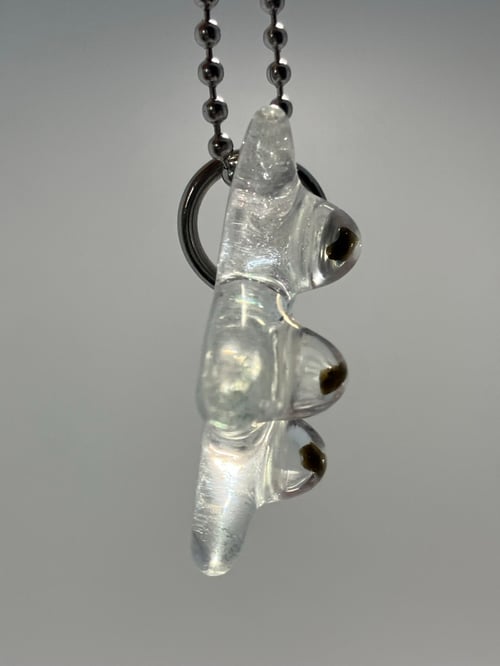 Image of dicro star with tektite incasment (collab with Wallander glass)