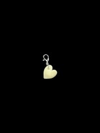 Image 1 of hand carved bone heart charm