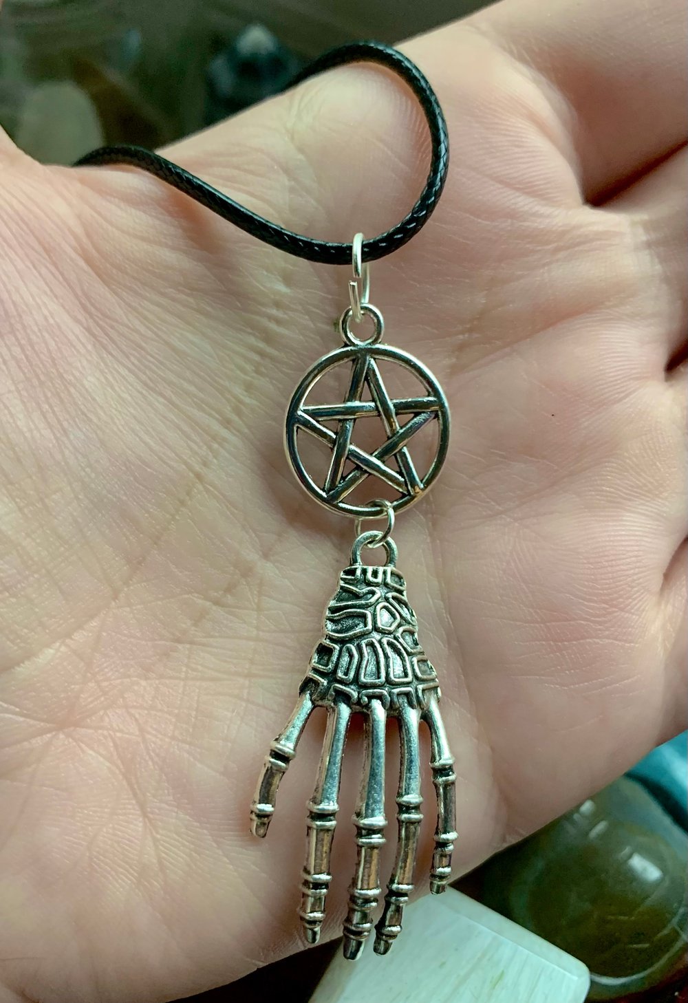 Image of Pentagram Skeleton Hand Necklace 