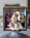 Pipe cleaner miniature cocker with its magnetic wooden display 