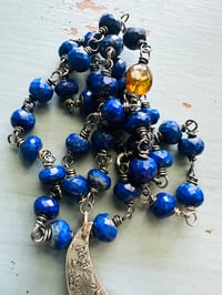 Image 5 of faceted lapis and brown garnet necklace with moon quote pendant