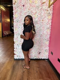 Image 4 of black shorts bodysuit. 