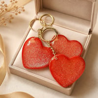Image 1 of Red Glitter Heart Resin Keychain – Handmade 