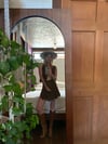 late 60s leather wrap skirt and vest set with flower details 