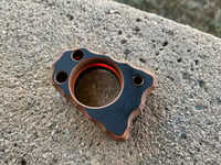 Image 1 of Orange and black g10 , orange glow center , purple valley carbon with chip cut