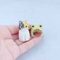 Image 3 of calico cat with frog hat ceramic figurine