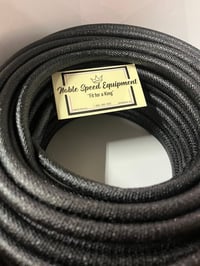 Image 1 of Tar covered wire loom 