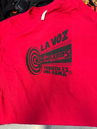 La  Voz También es un Arma T-Shirt