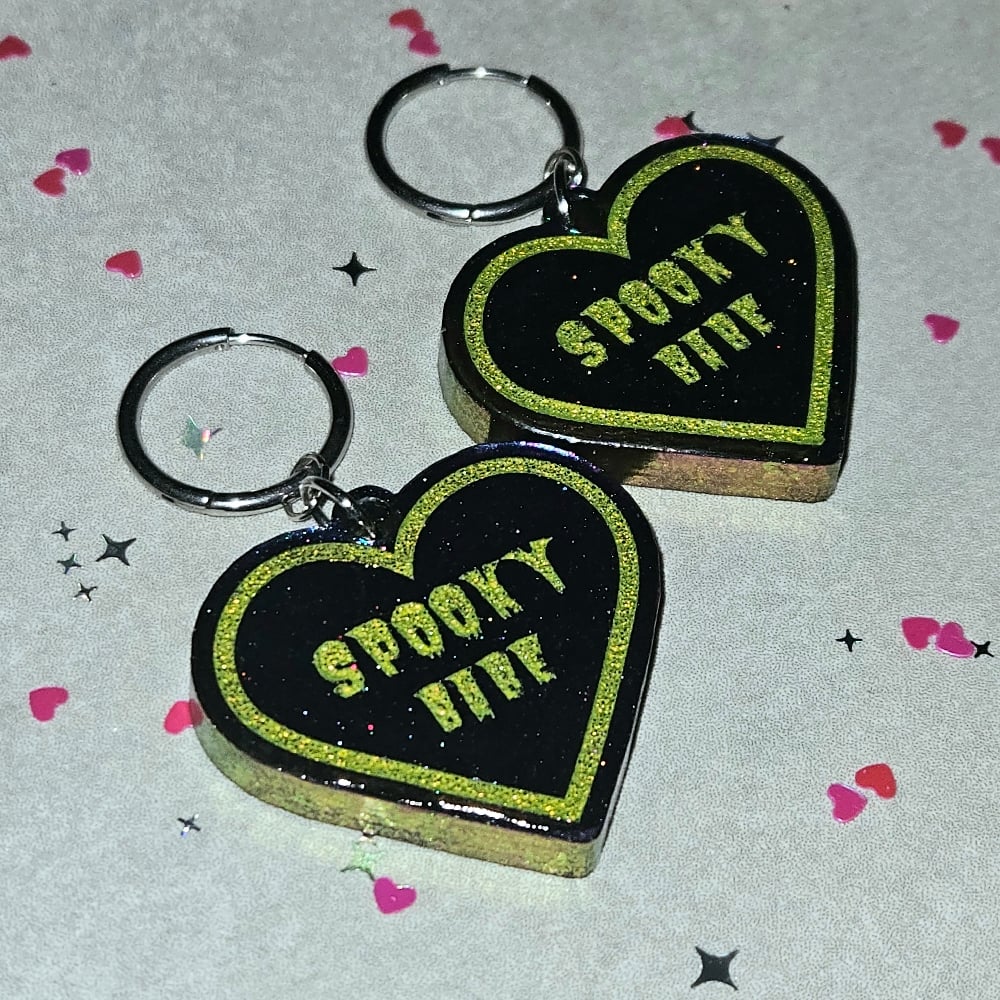 Image of Spooky Babe Heart Earrings: Purple/ Blue Color-shift w/ Chartreuse Lettering