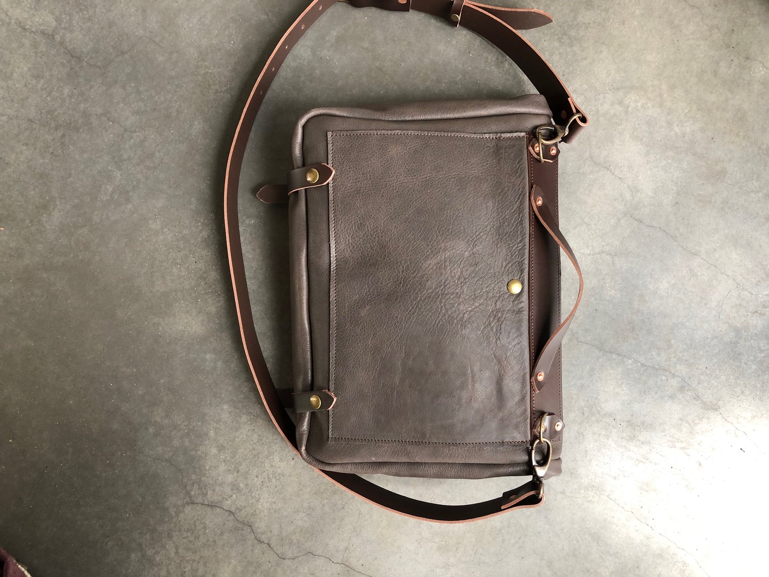 Image of Leather messenger with folded top in oiled leather Musette Satchel with adjustable shoulderstrap