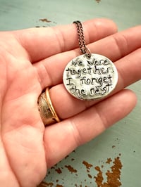 Image 4 of green sapphire pendant with handwritten quote