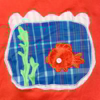 Image 2 of fishbowl shirt