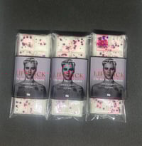 Lipstick on my satin sheets 