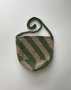 Green and beige striped bag