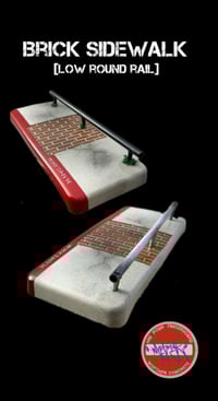 Image 2 of Brick sidewalk with low round rail