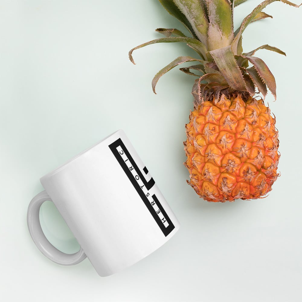 White glossy h mug