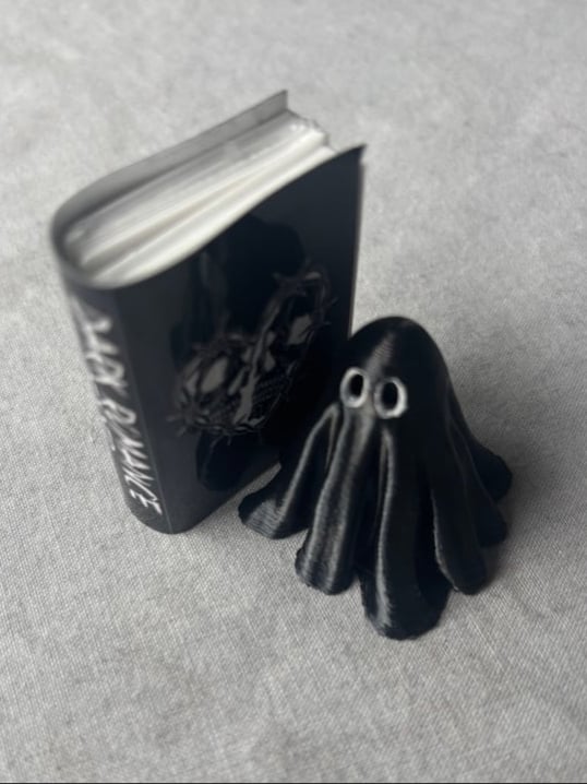 Image of Ghost with trope book 