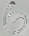 "Starlight" The Star -short in clear quartz and hematite 