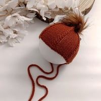 Image 1 of  Newborn  photoshooting knitted hat | with pompom | rusty red